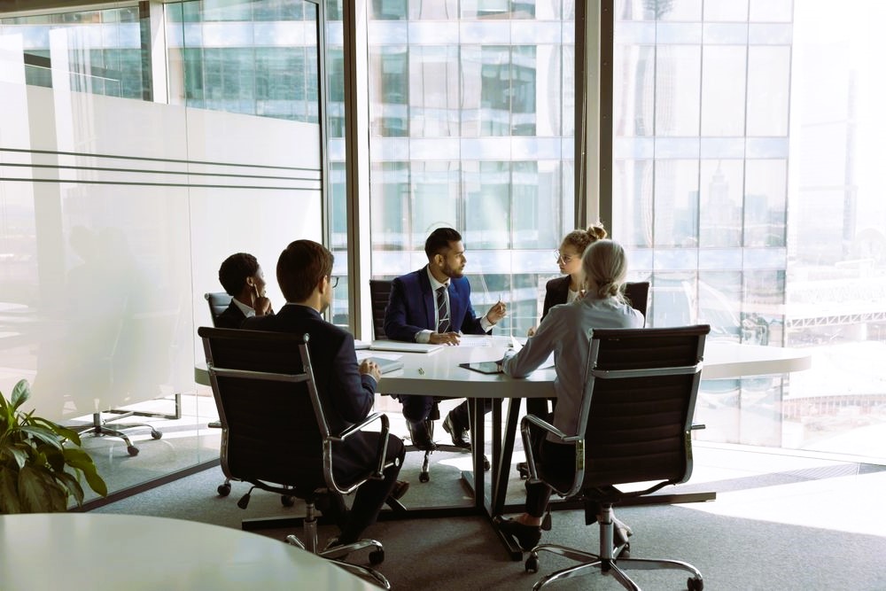 Group of people at a table
