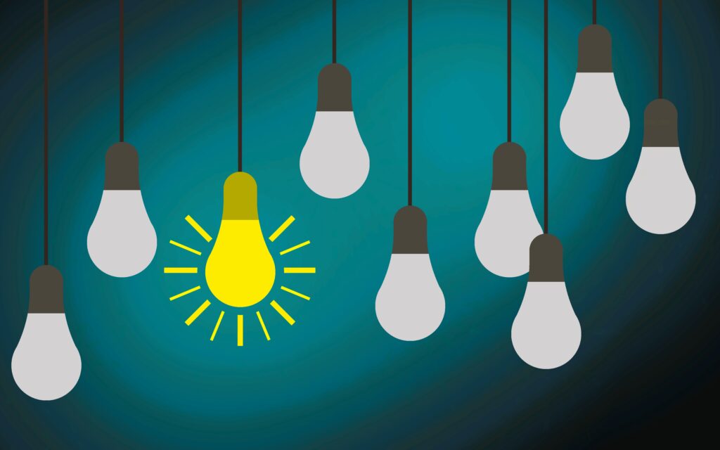 Idea concept with light bulbs on a blue background